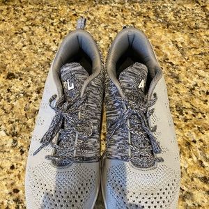 Men’s APL size 10 shoes.